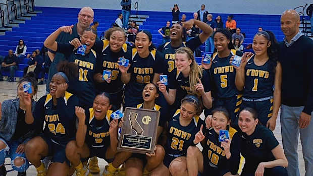 B. O'Dowd girls posing after title 2